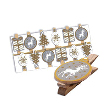 Load image into Gallery viewer, Wooden pegs displayed in 4 different Christmas designs
