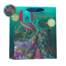 Load image into Gallery viewer, Christmas gift bag with a peacock illustrated on it

